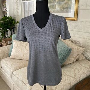 Women’s exercise shirt by Adidas